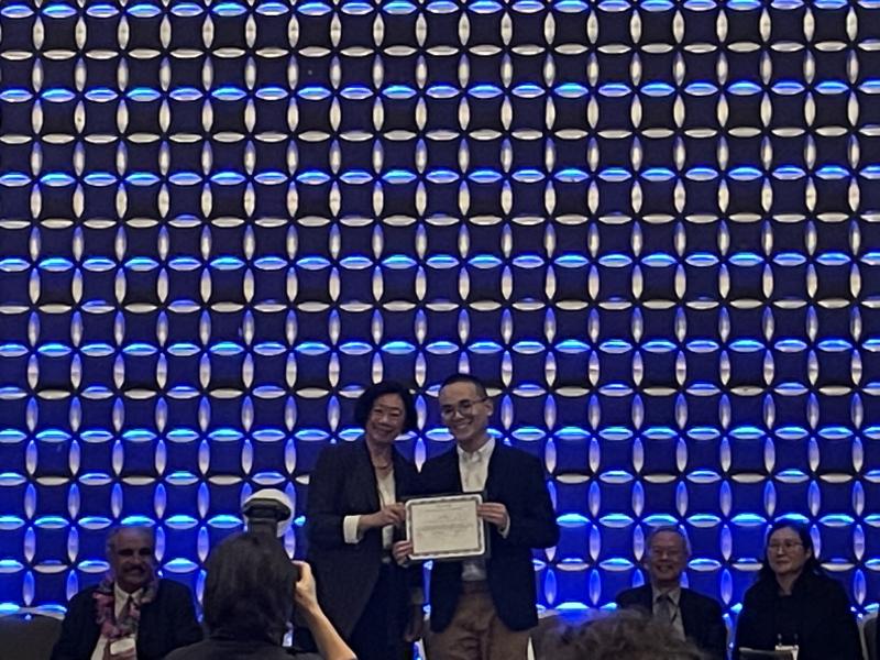 Yifan Li Accepting Award