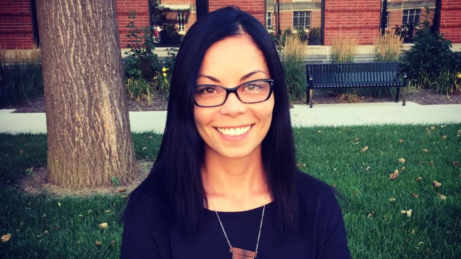 Professor Namiko Kunimoto outside on OSU campus in front of building
