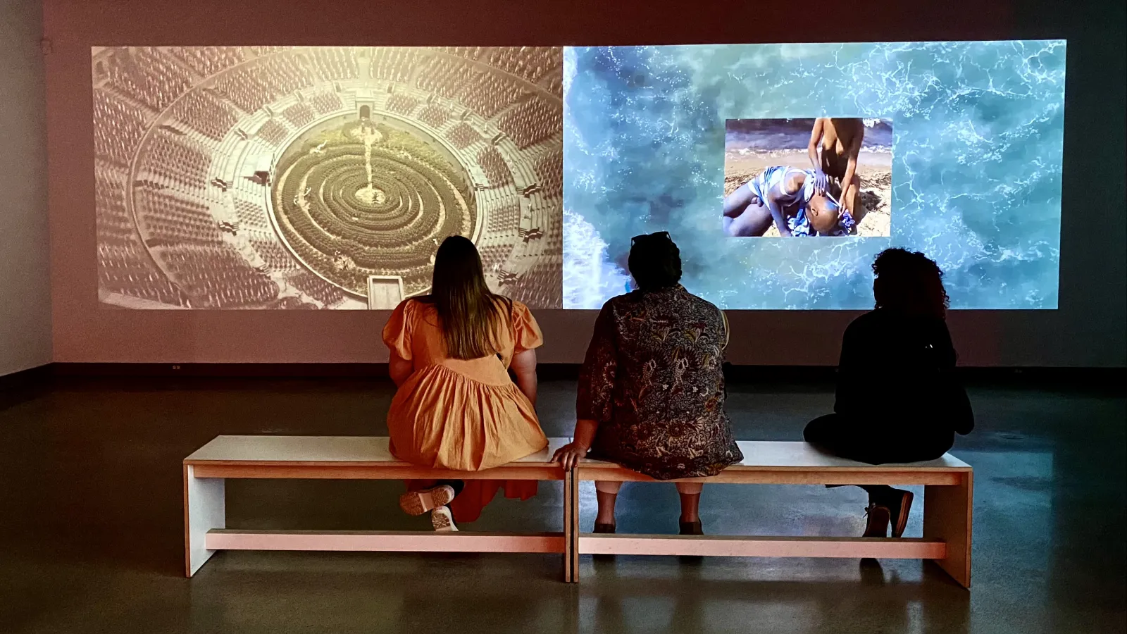 students looking at art in a museum