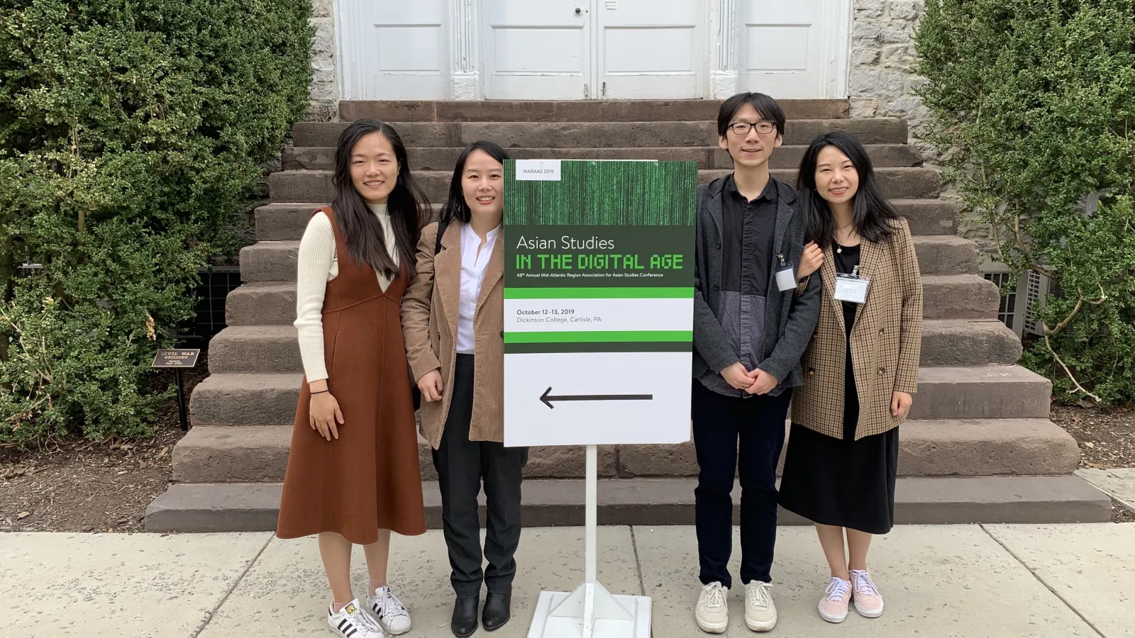 4 students at conference