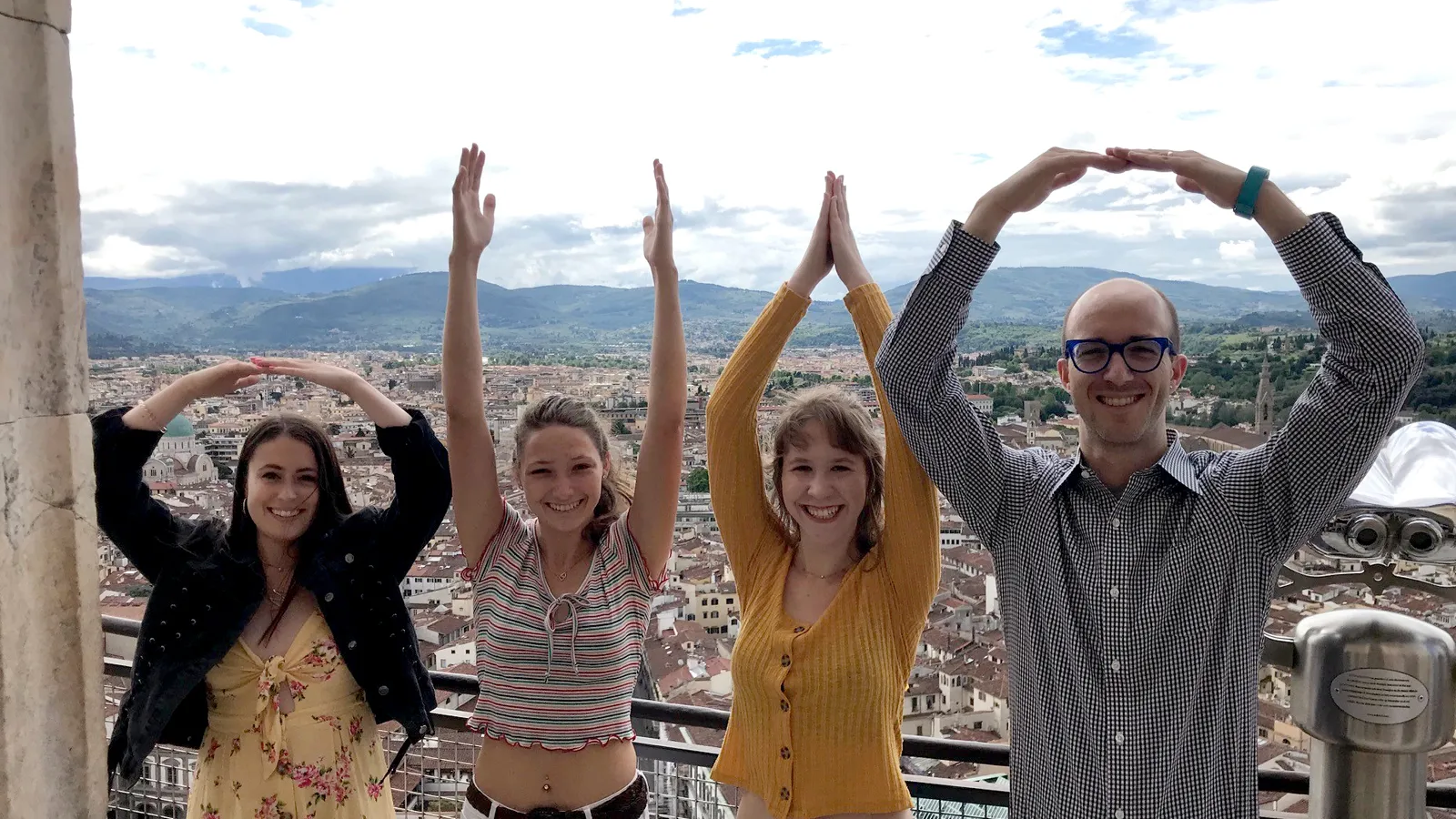 students and professor spelling OHIO in Italy