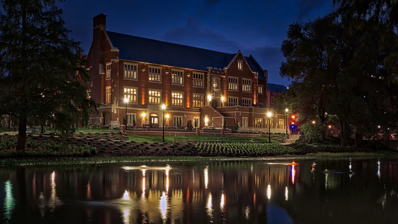 Pomerene Hall and Mirror Lake at night