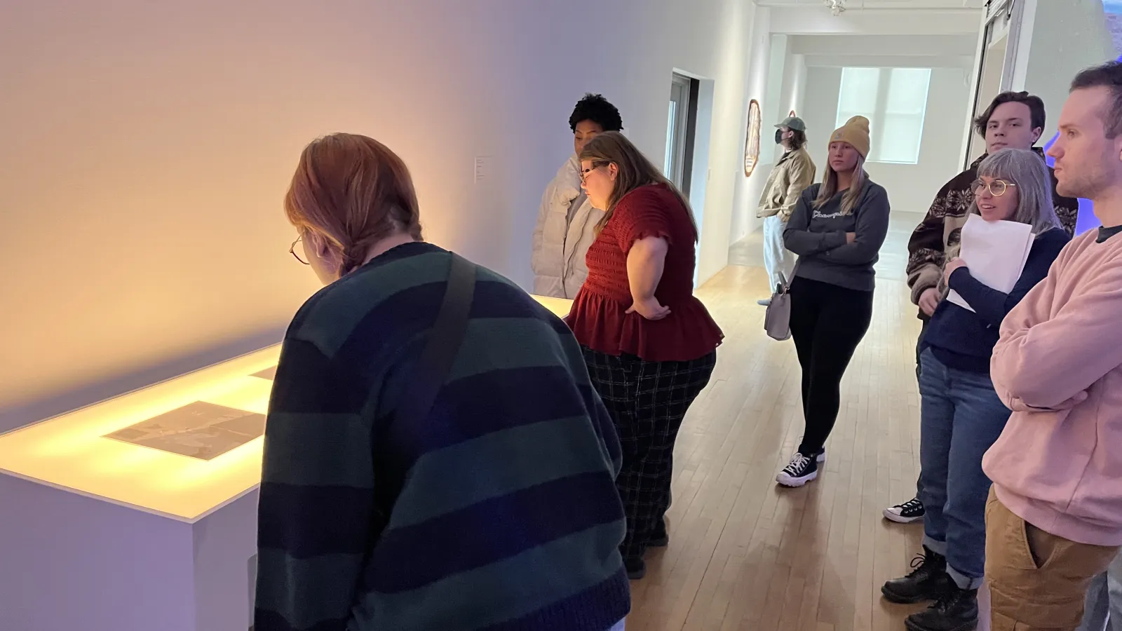students studying artwork