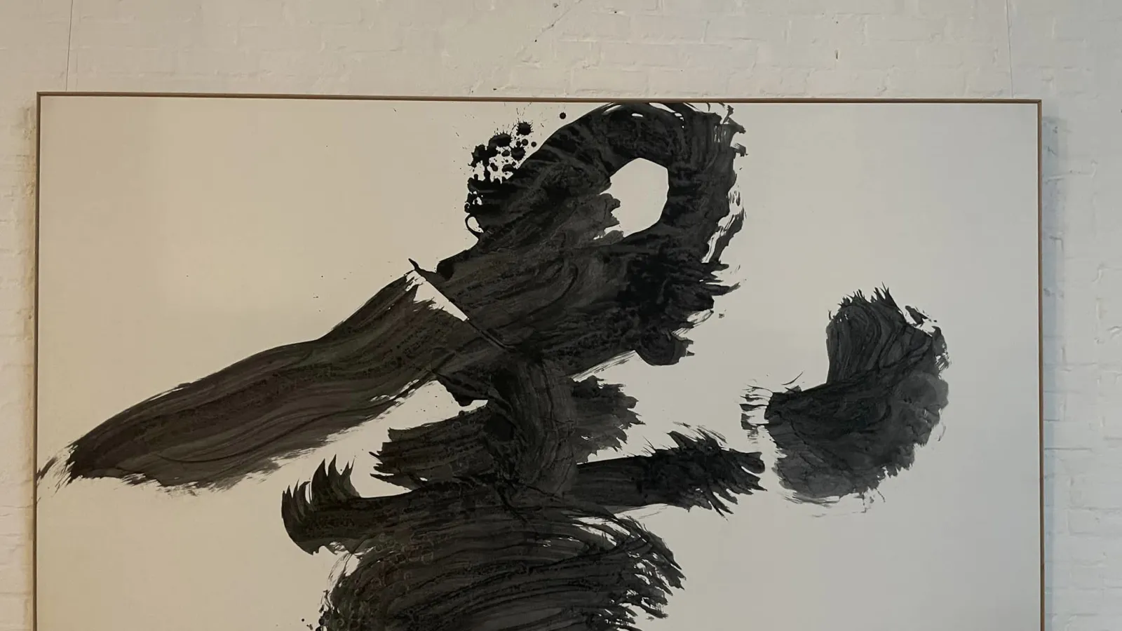 Abstract art work in what appears to be black paint.