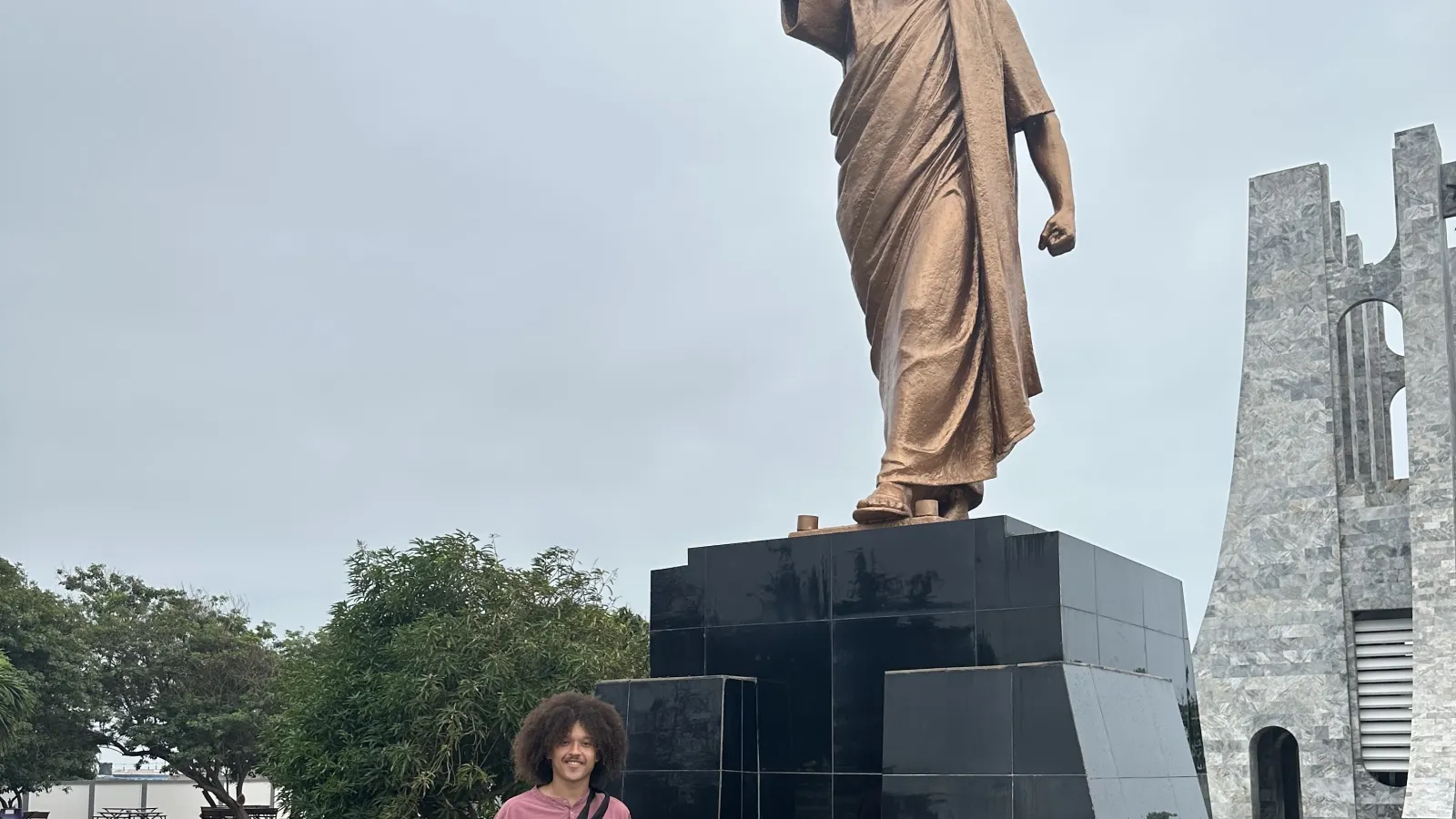 Sterling and the statue is at the Kwame Nkrumah National Museum & Mausoleum.