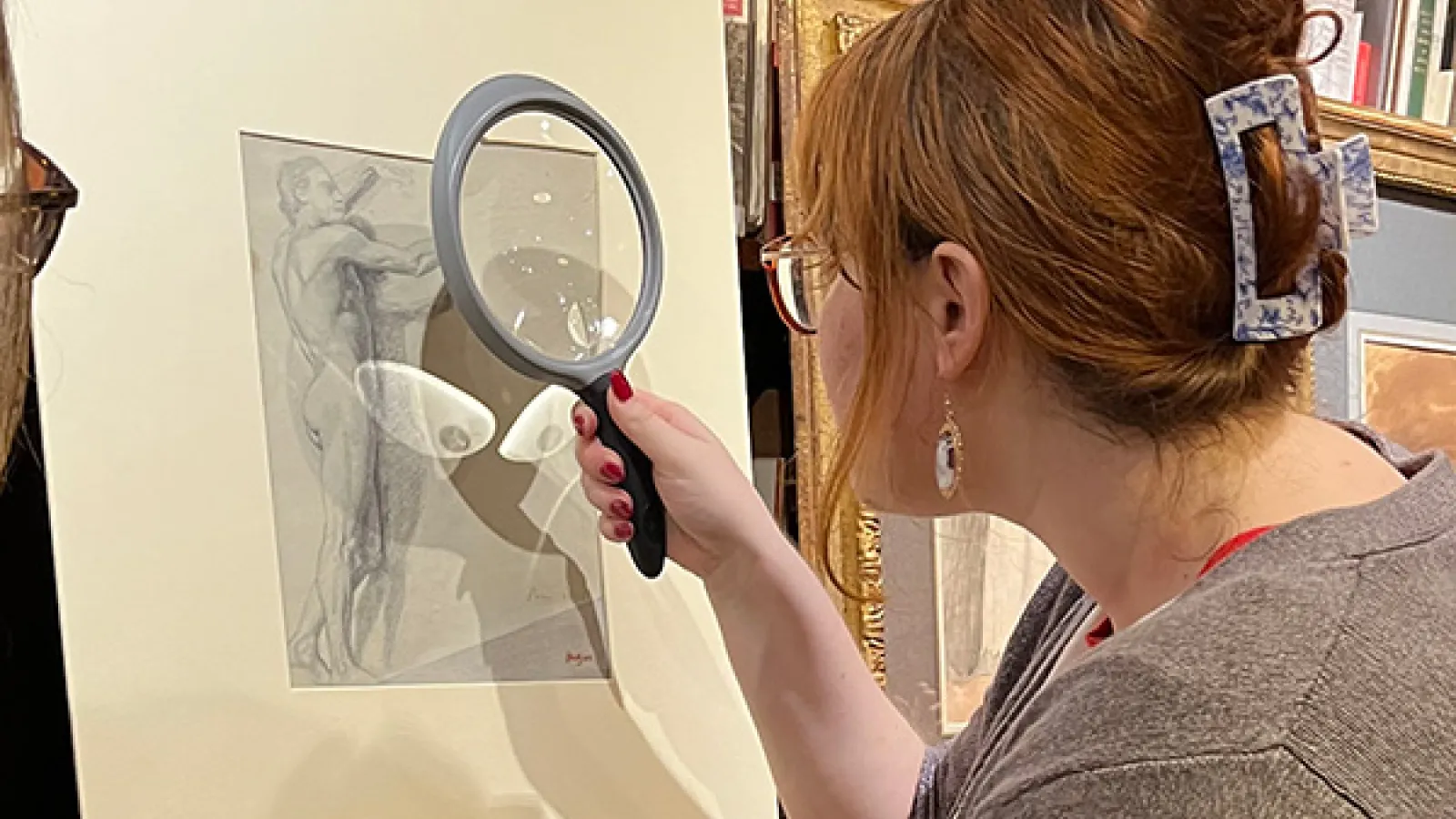Students viewing drawings. 