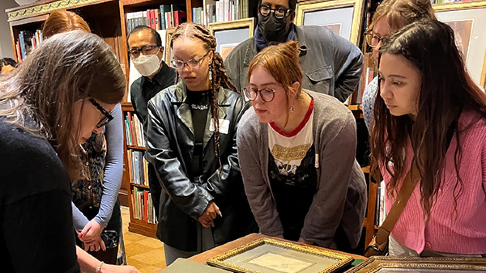 Students viewing drawings.