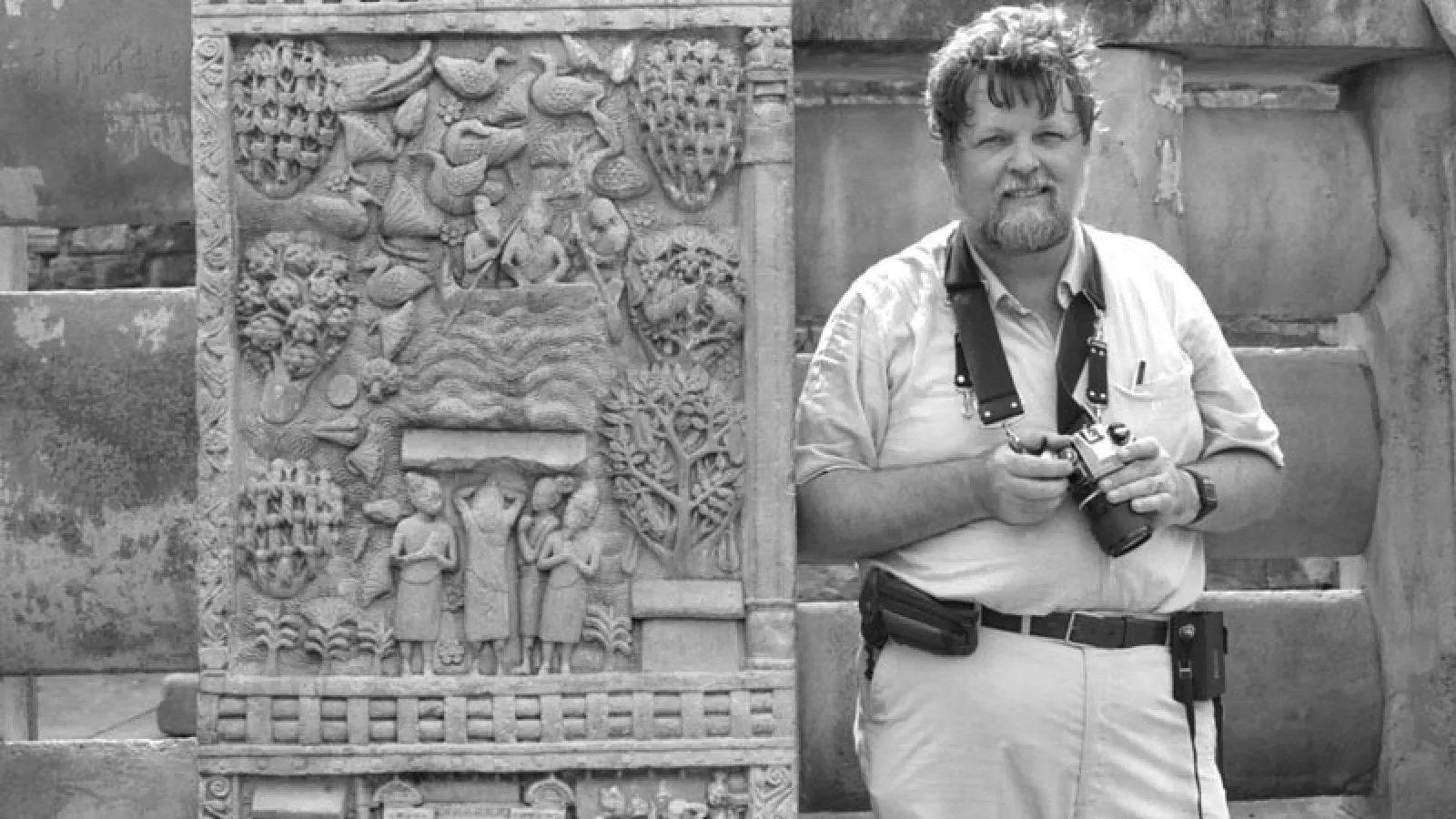John Huntington photo - standing with camera 