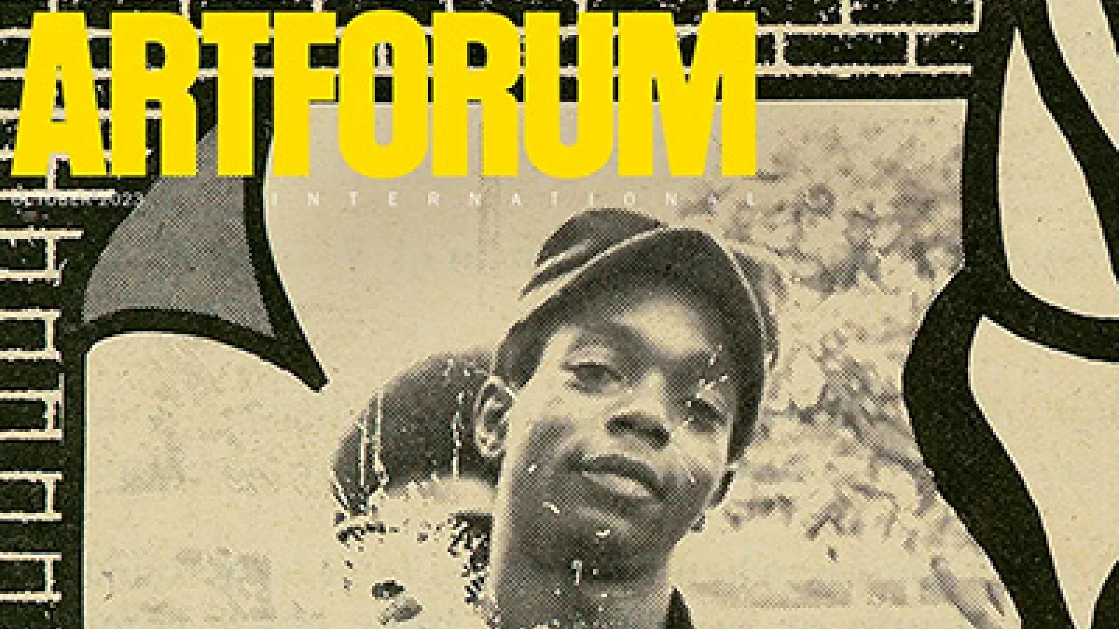 The cover of Artforum magazine with the publication's title in yellow text at the top and an image of a young Black man surrounded by graphics in the background