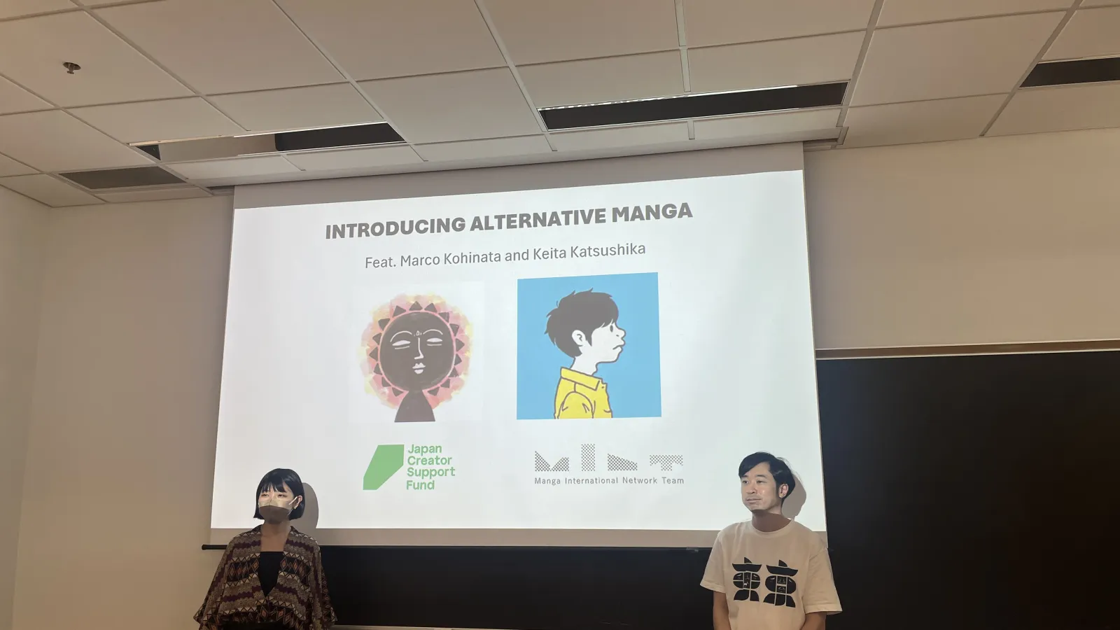 Guest speakers in front of their manga presentation