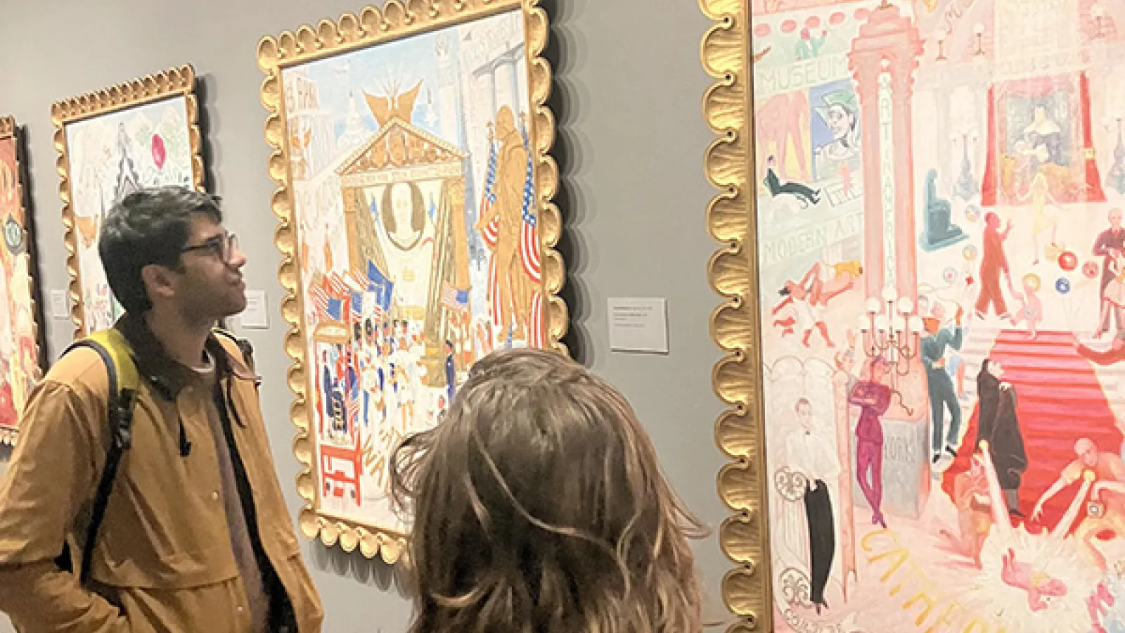 Students view artwork 