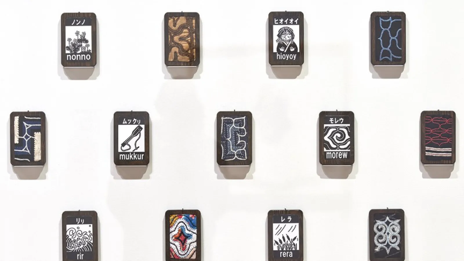 small wood prints on a wall