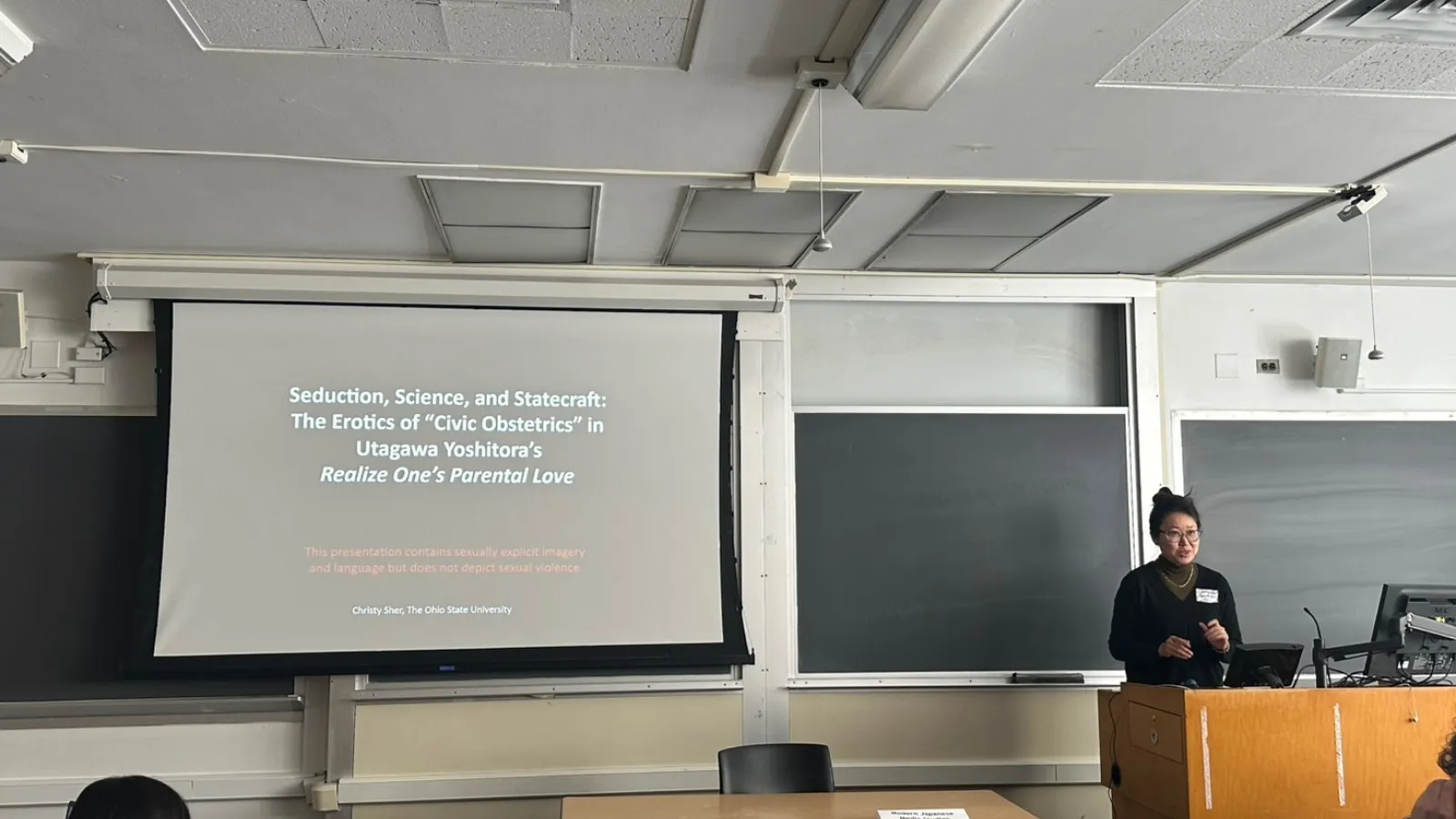 Christy Sher presenting her paper as a slideshow