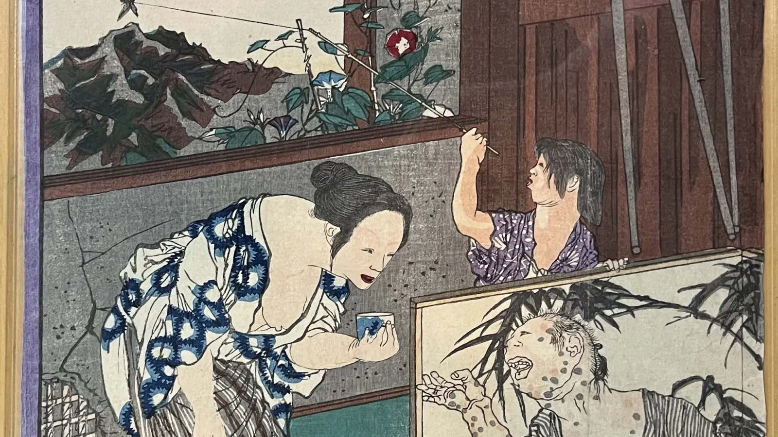one person bowing to a seated person