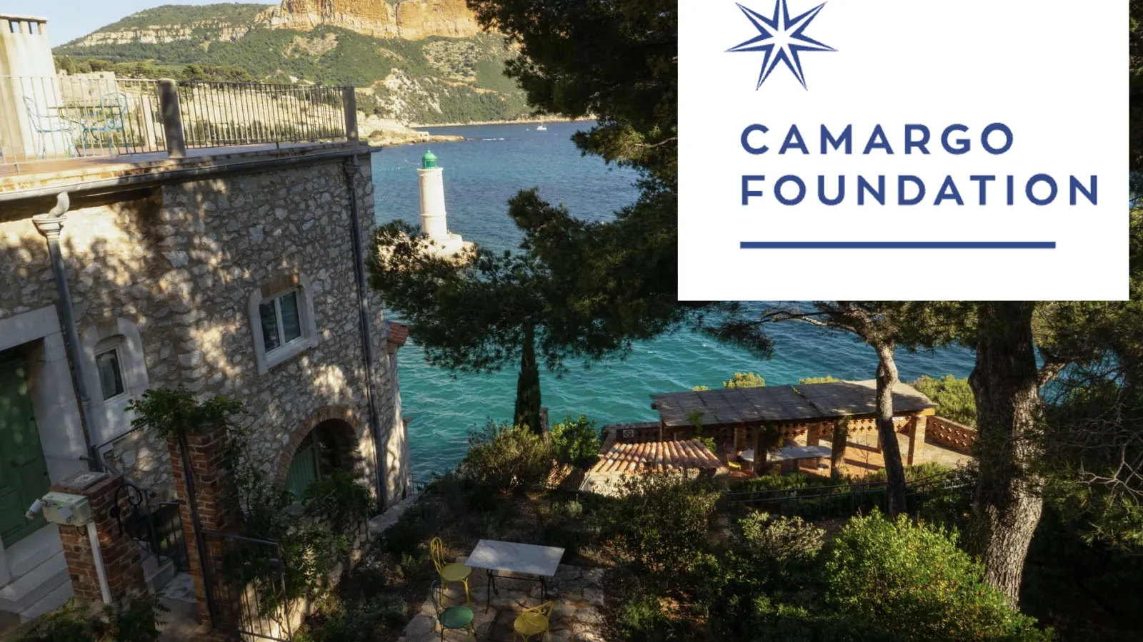 Camargo Foundation in Cassis, France, with stony building against water.