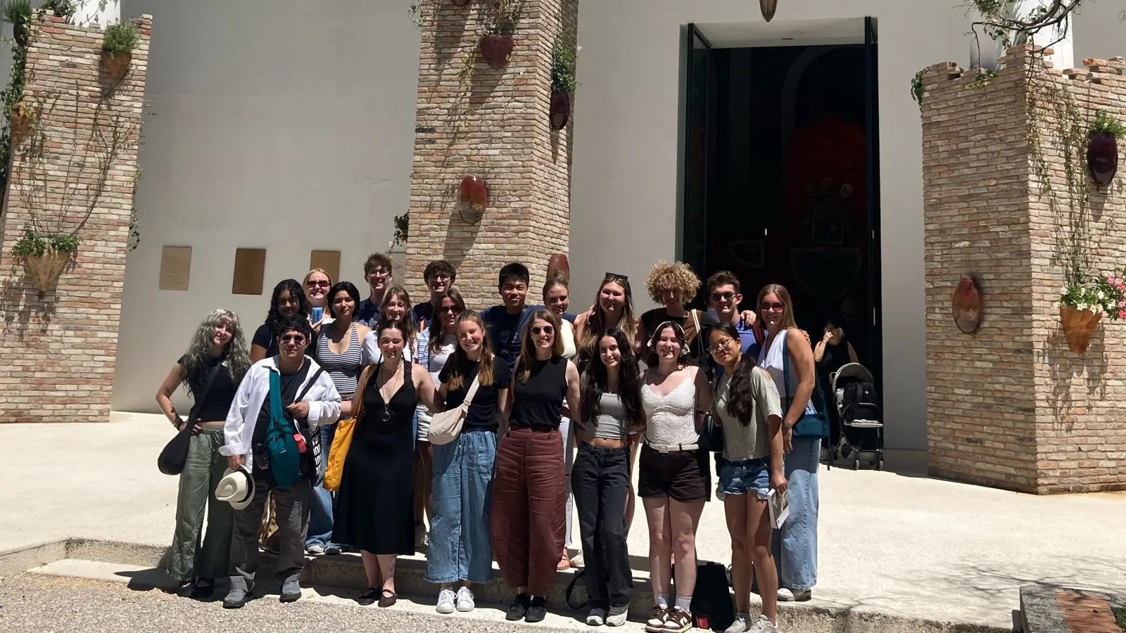 Whole group photo outside biennale