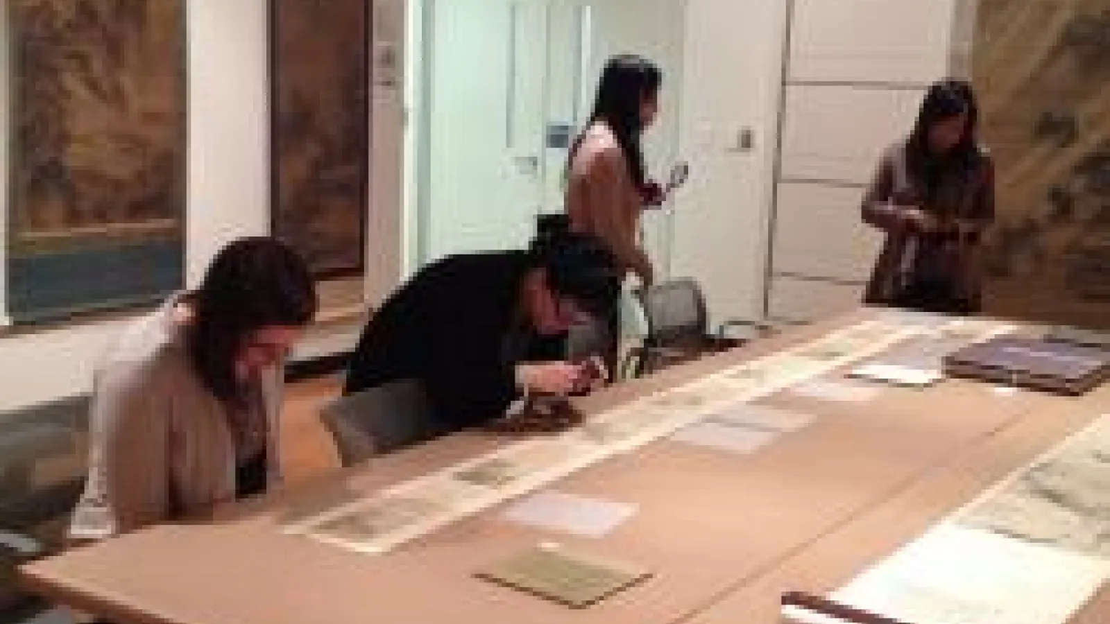 Students working in archive.