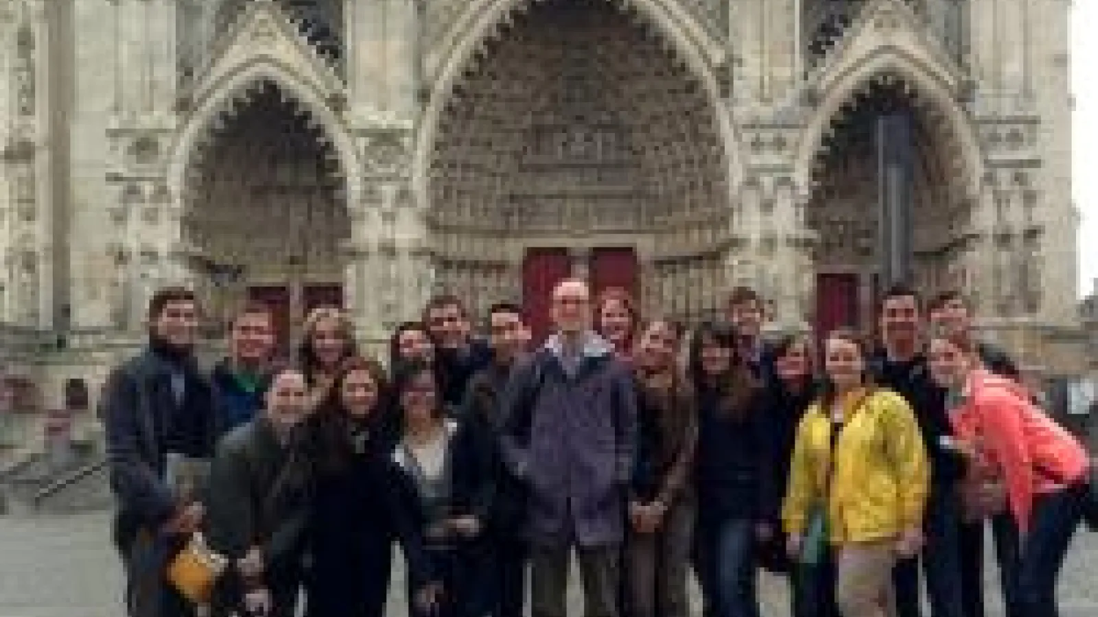 Karl Whittington and a group of students in front of architecture abroad