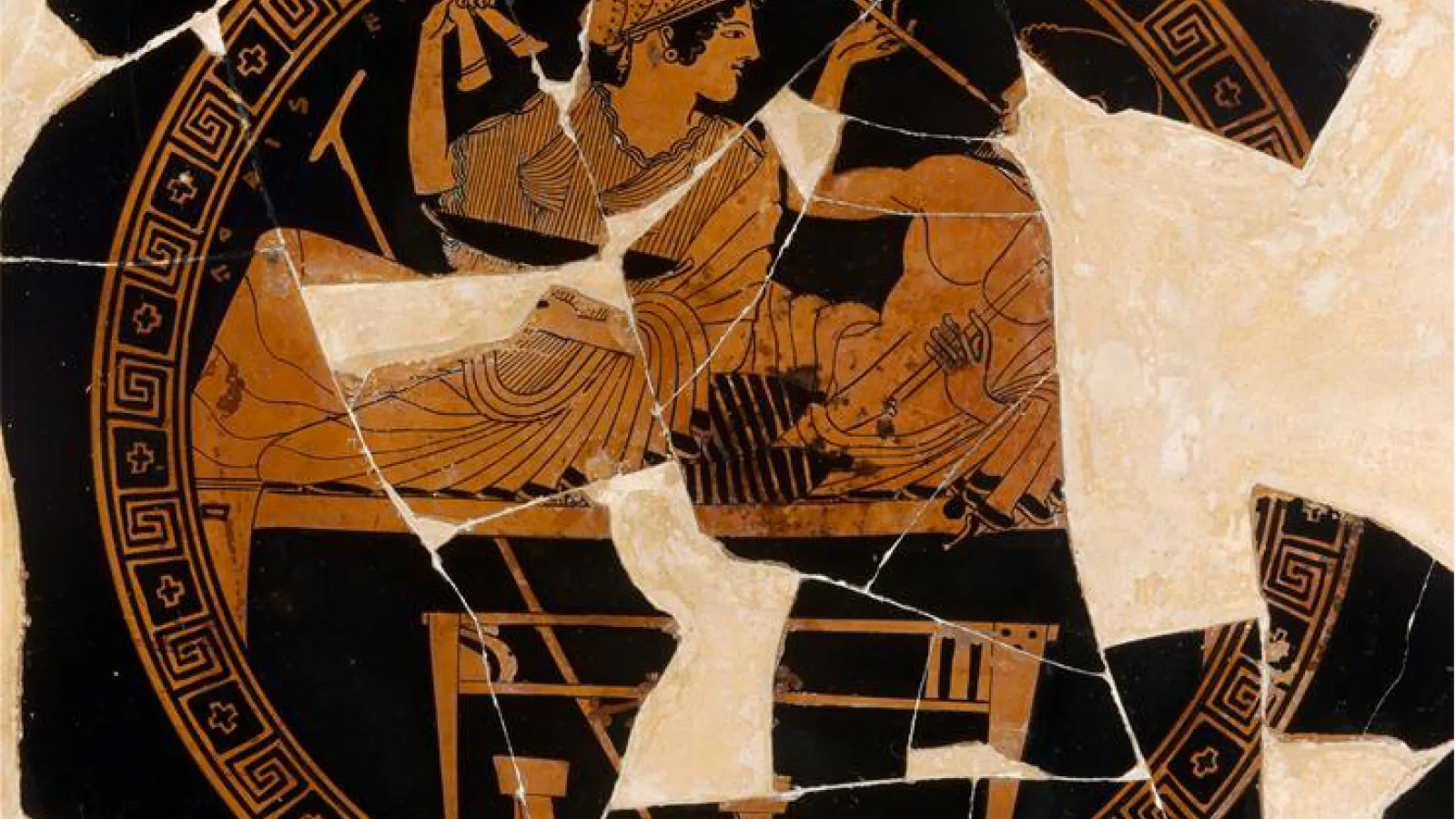 A Greek vase with many cracks running through it
