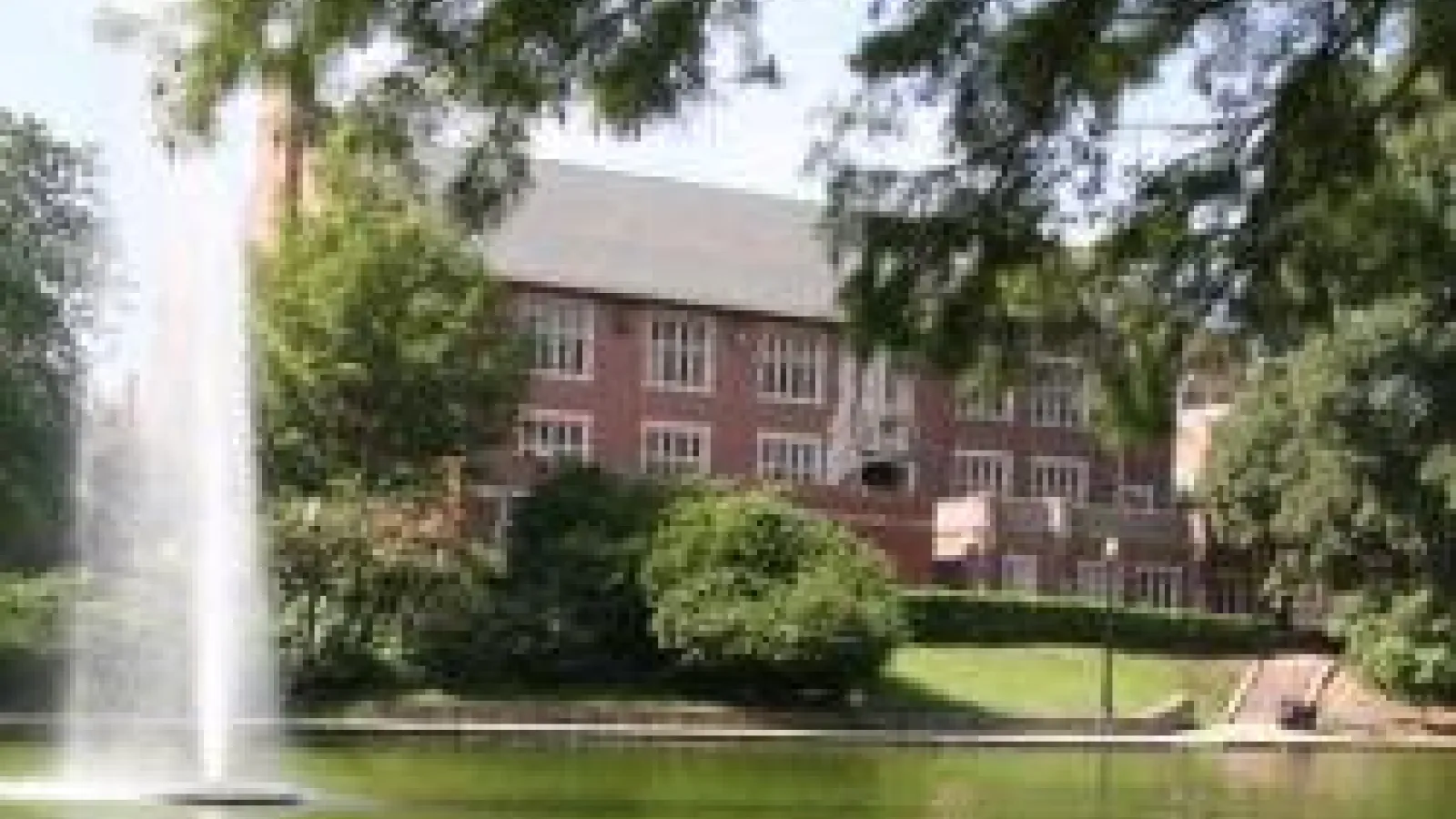 Pomerene Hall behind Mirror Lake