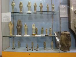 display case of Egyptian artworks