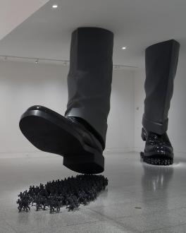 Doh Ho Suh artwork sculpture large feet stepping on small people