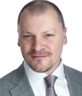 Rick Kinsel headshot, wearing suit with white background