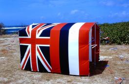 tent made of flags on beach