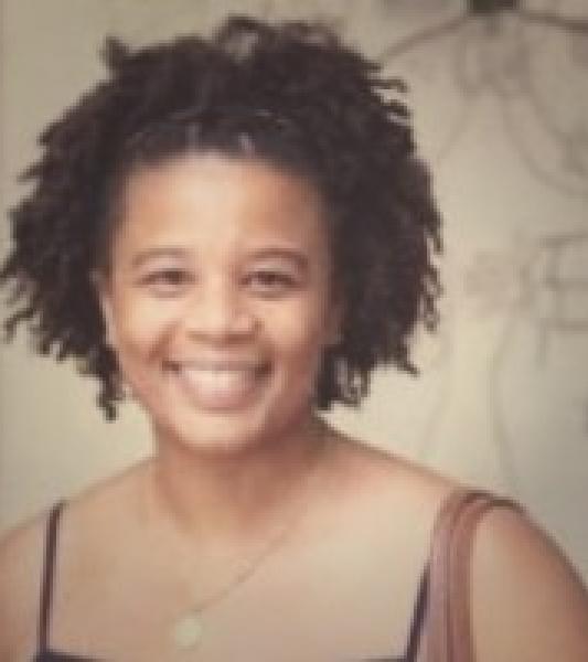 Woman smiling.