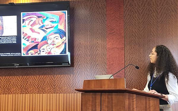 Asia Adomanis presents at the Space Between Society Conference