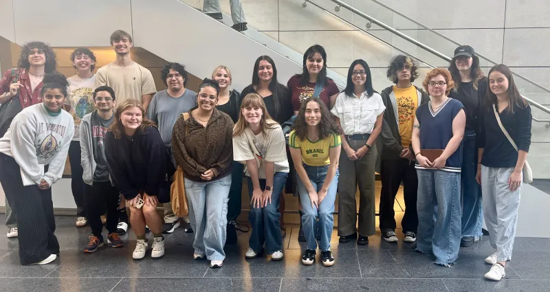 A class photo inside the museum