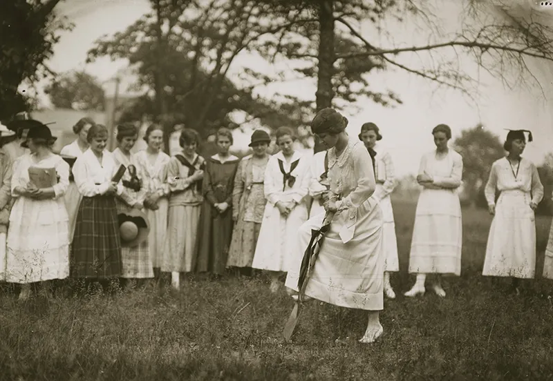 groundbreaking of Pomerene - woman with shovel
