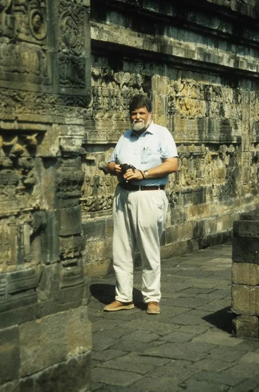 John Huntington photo - standing with camera 