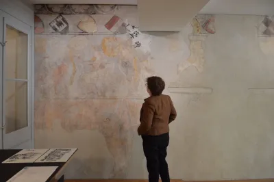 Viewing a mural of courtly hunting at Brunngasse 8, Zurich, in the "ballroom" of a 14th-century Jewish home.