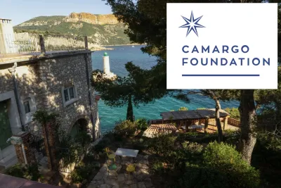 Camargo Foundation in Cassis, France, with stony building against water.