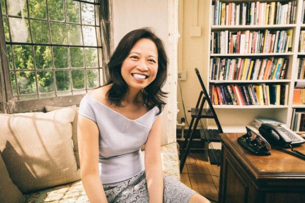 woman smiling in study