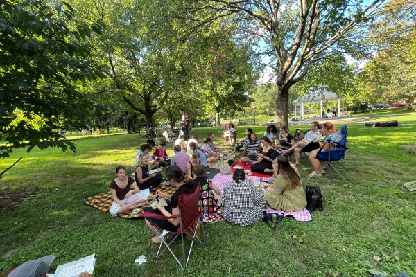 Image of department members and staff having a picnic. 