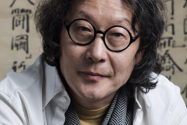 Headshot of artist Xu Bing
