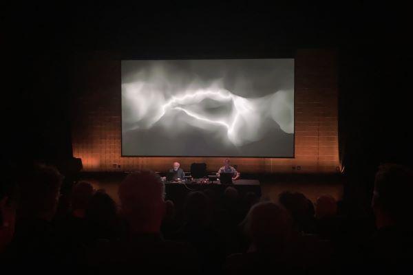 Morton Subotnick performing "As I Live and Breathe" in front of an audience