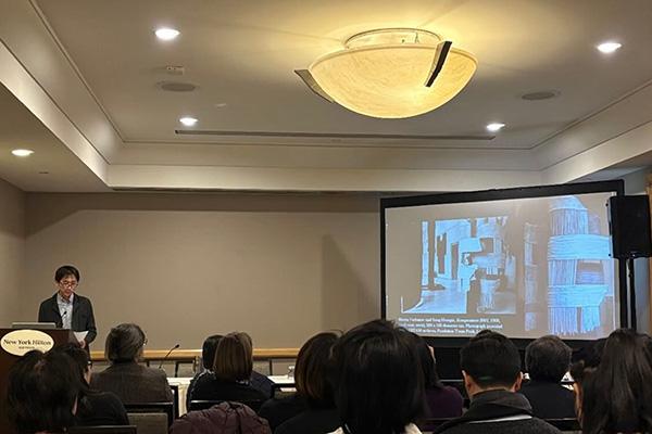 Keyu Yan presenting at the CAA Conference.