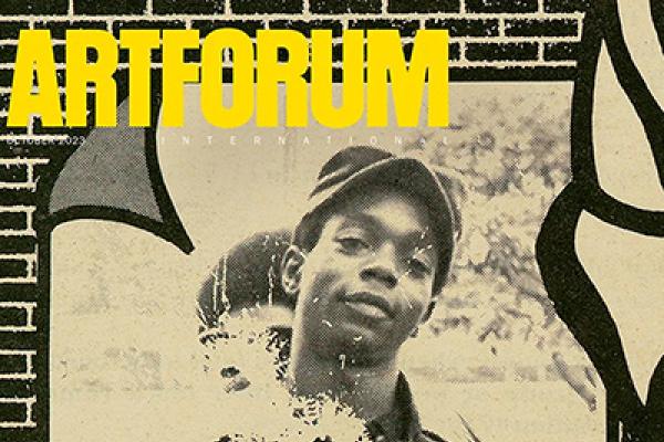 The cover of Artforum magazine with the publication's title in yellow text at the top and an image of a young Black man surrounded by graphics in the background