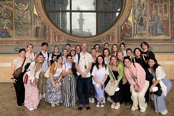 Students in the study abroad course pose with Professor Karl Whittington in Rome, Italy