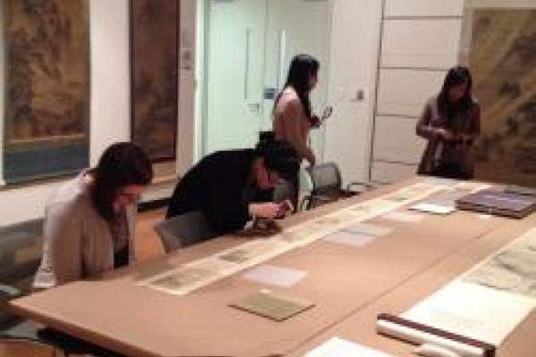 Students working in archive.