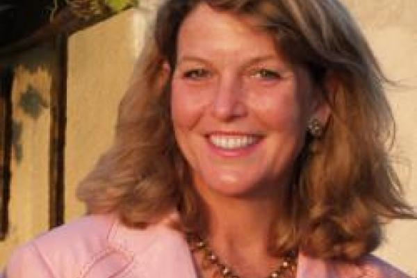 Joan Breton Connelly wearing pink blazer 