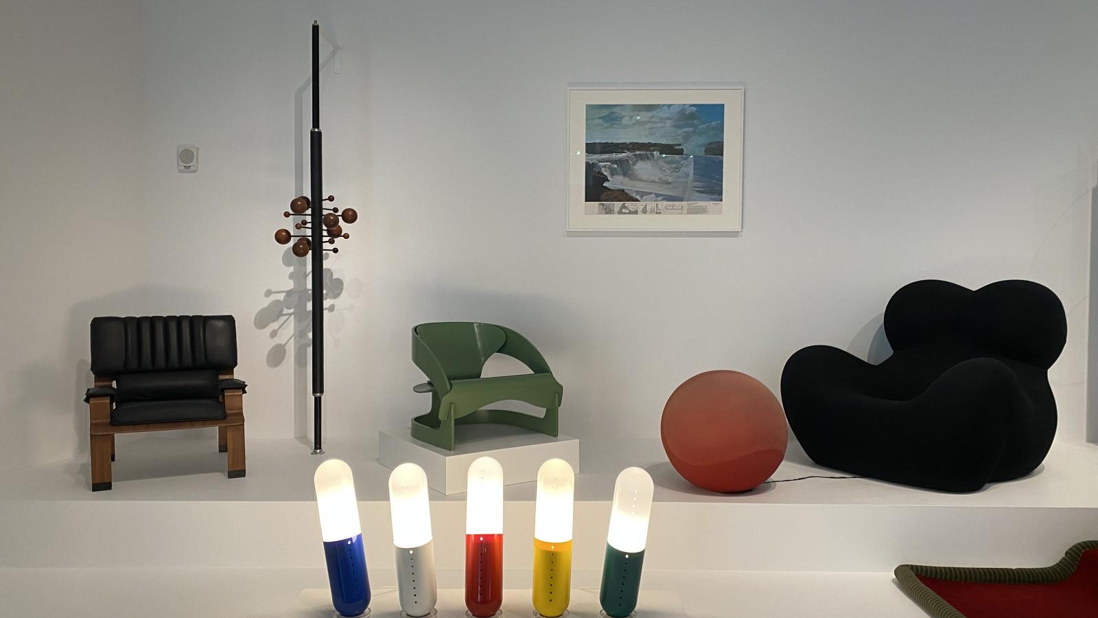 artwork installation featuring chairs and light sculpture