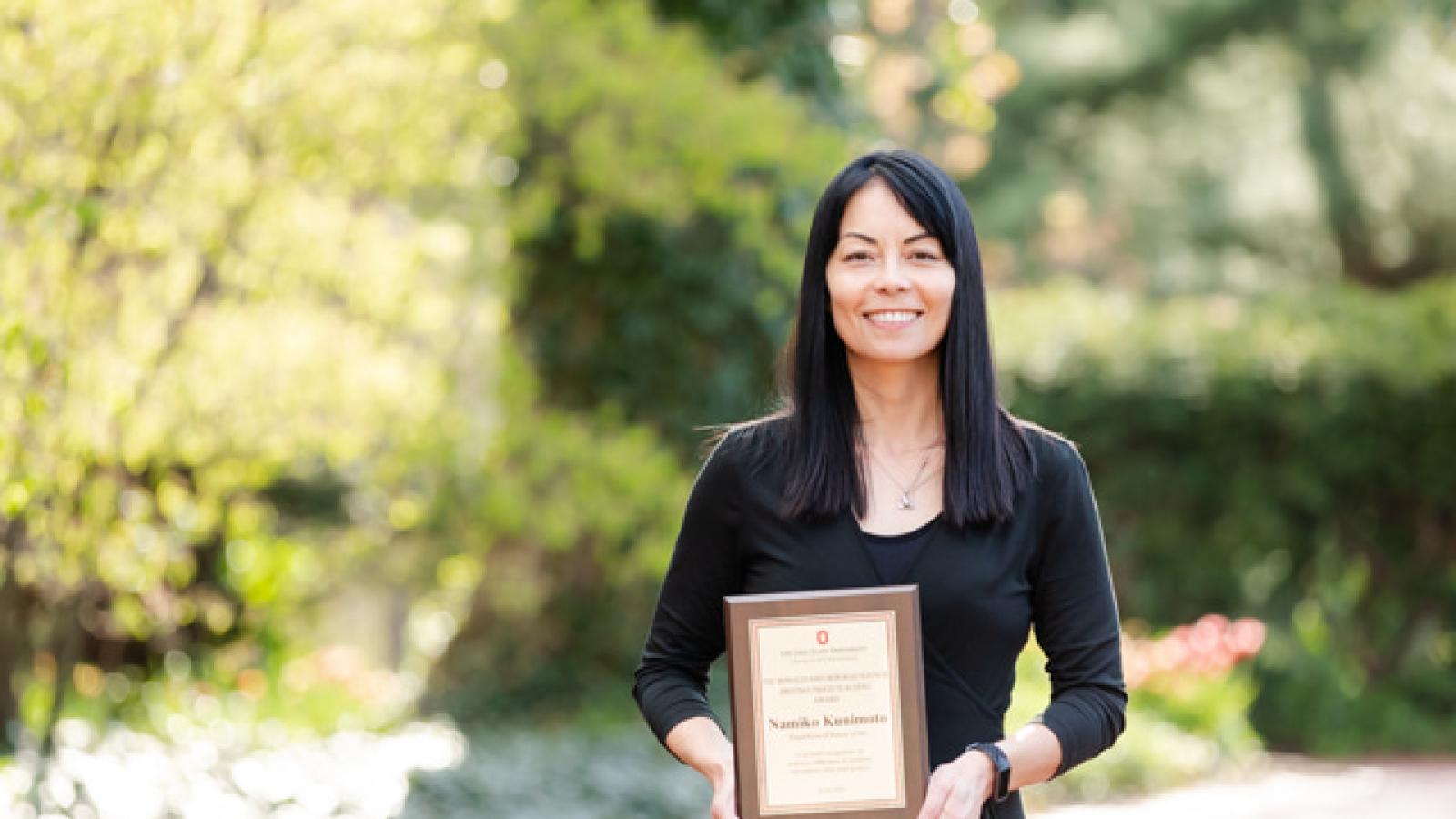 Namiko Kunimoto holding Ratner Award