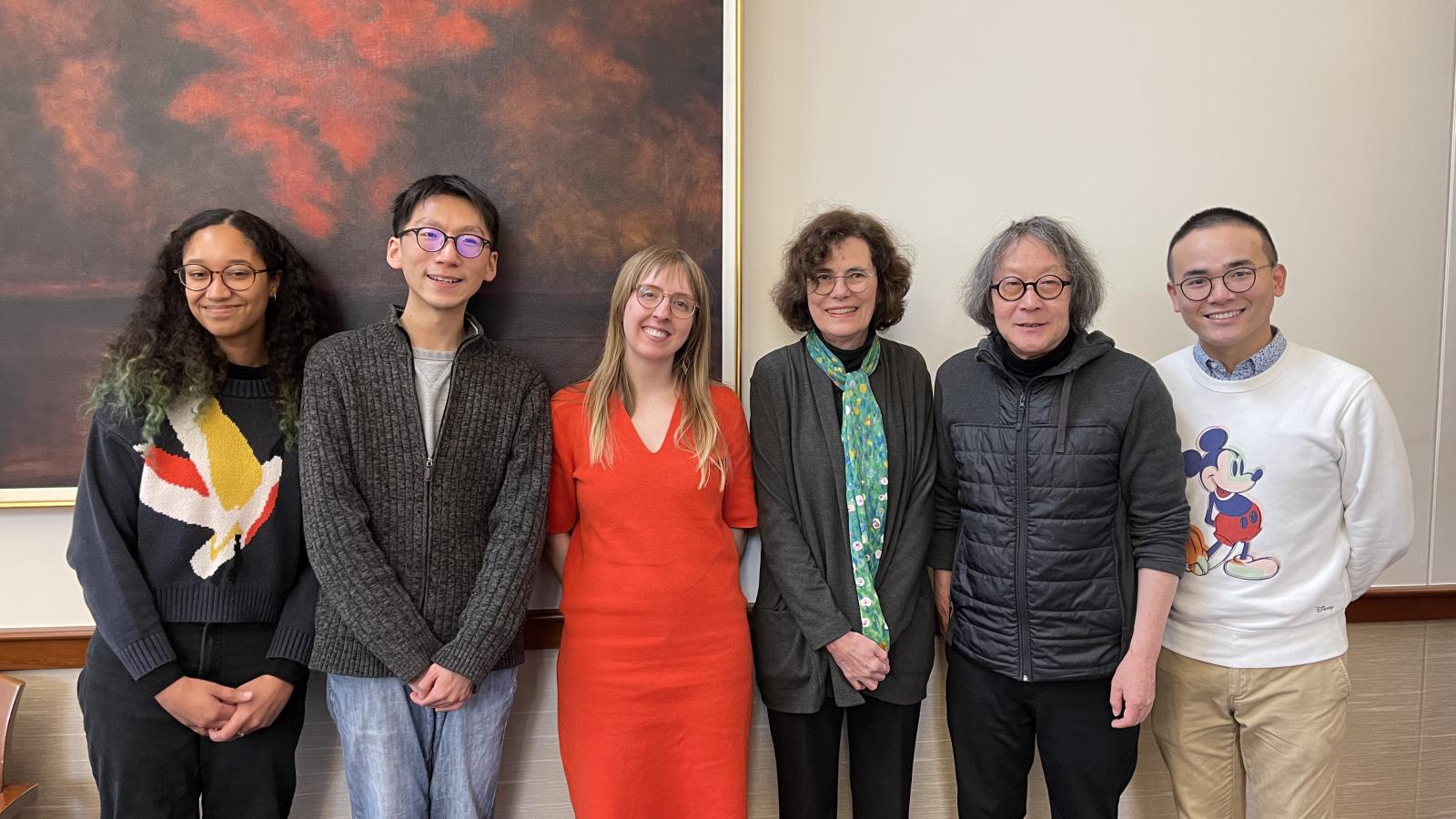 Faculty and staff with the artist Xu Bing