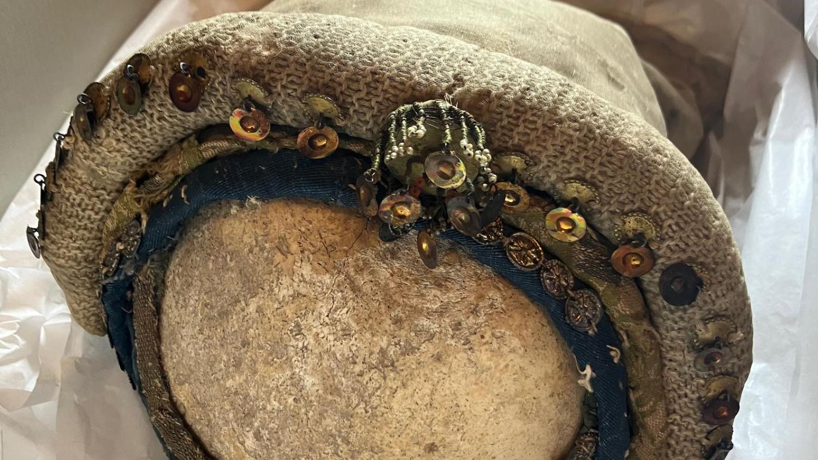 metal appliques on a 15th century skull relic