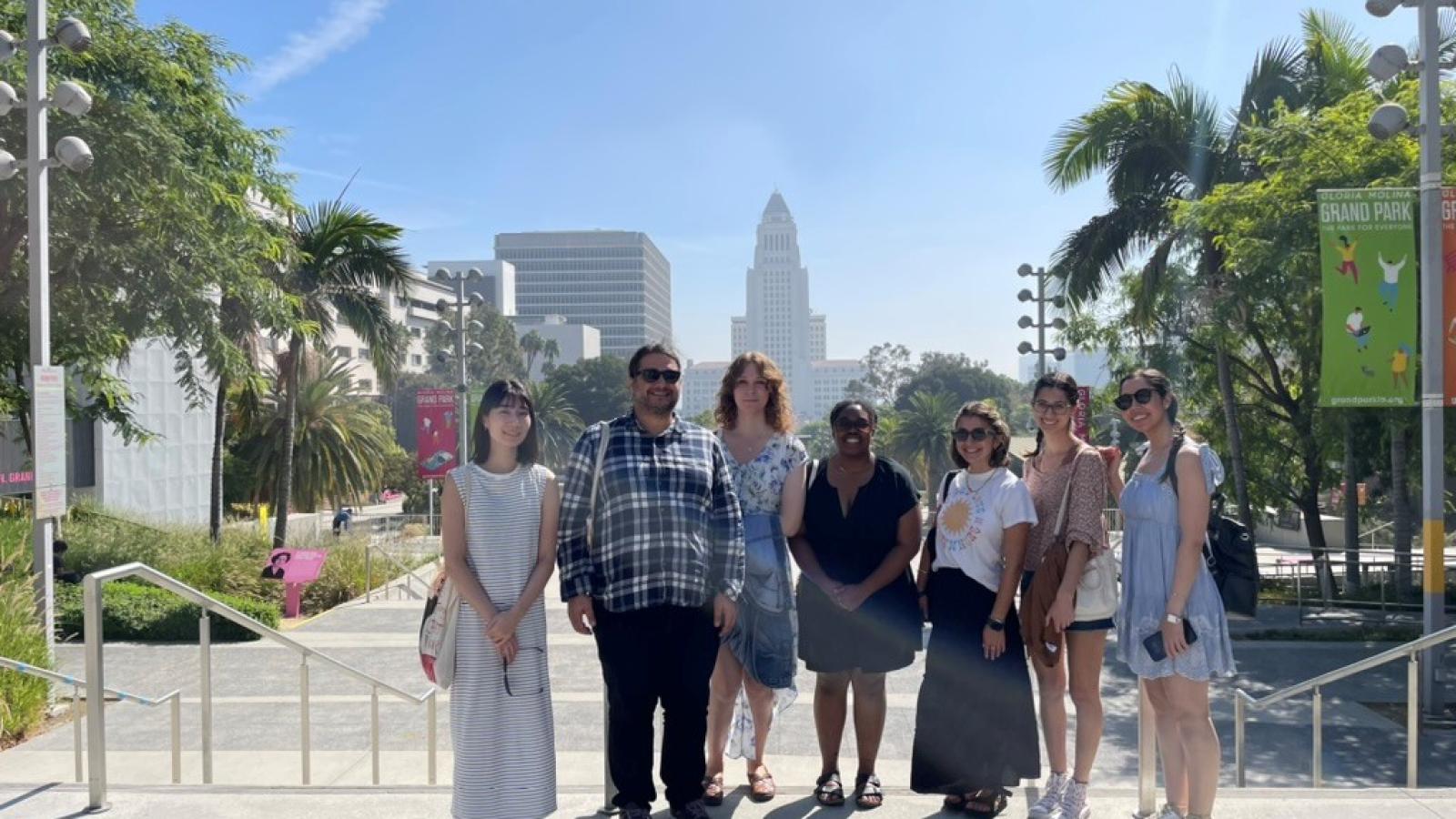 People standing with the skyline behind them