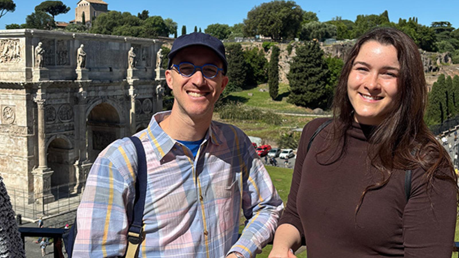 Professor Whittington and Emilela Thomas-Adams pose for a picture in front of the Arch of Constantine, Rome